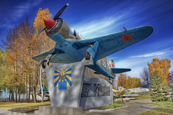 The Yak-11 aircraft froze on a pedestal