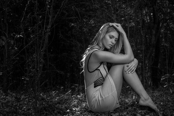 Sad girl on a black and white background