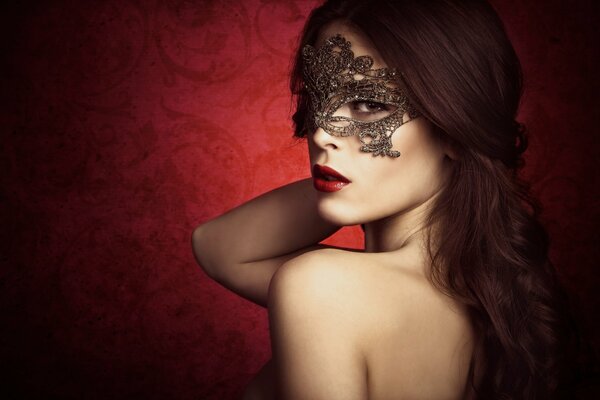 The girl in the mask. Burgundy background