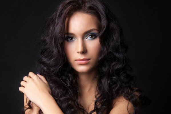 Brunette with beautiful makeup close-up