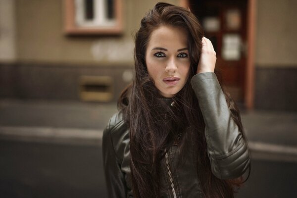 Portrait of a girl in a black leather jacket