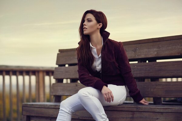 Beautiful girl on the bench