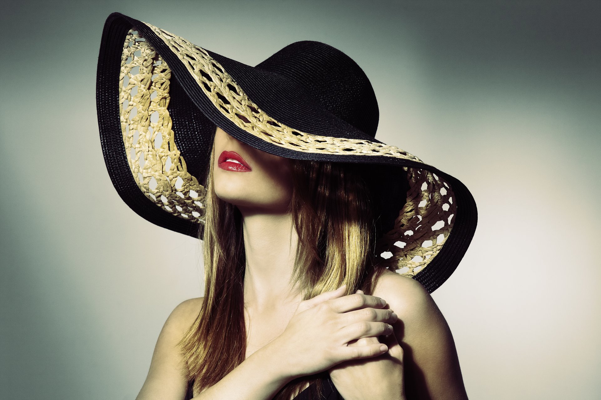 girl hat make-up red lips hair hands background