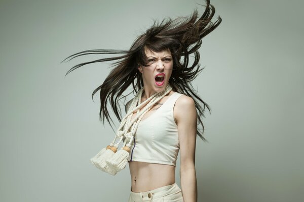 Screaming girl in a halo of hair