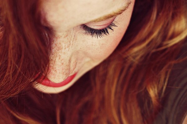 Red-haired girl with freckles