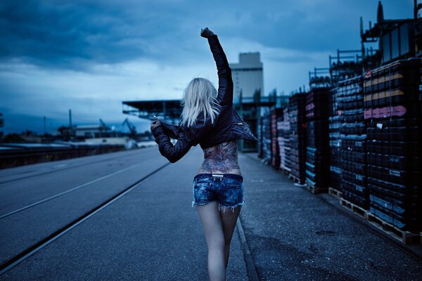 Photo of a girl with a tattoo on her back