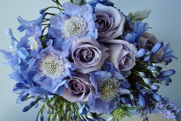 Bouquet of wildflowers in cold blue