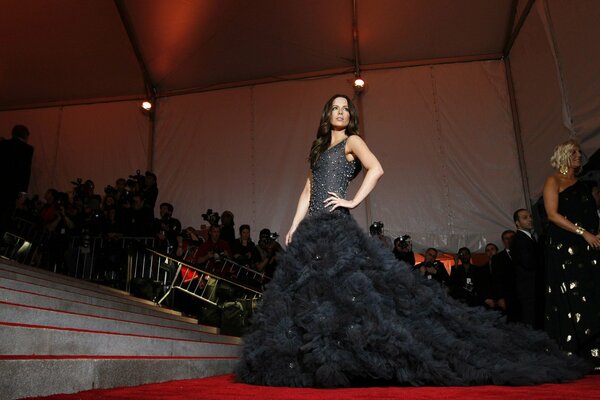 A girl in a black chic dress