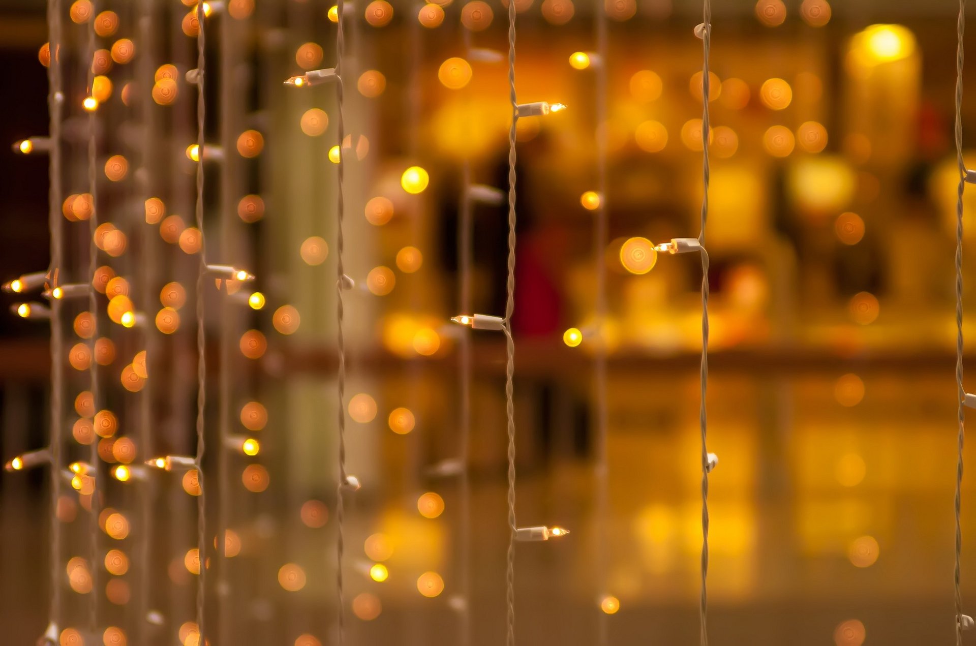 macro bokeh light bulb blur garland yellow