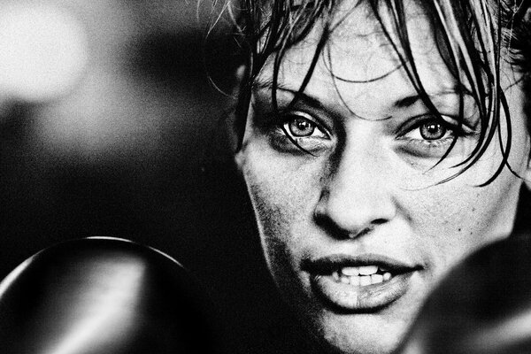 Black and white photo of a boxer during a fight