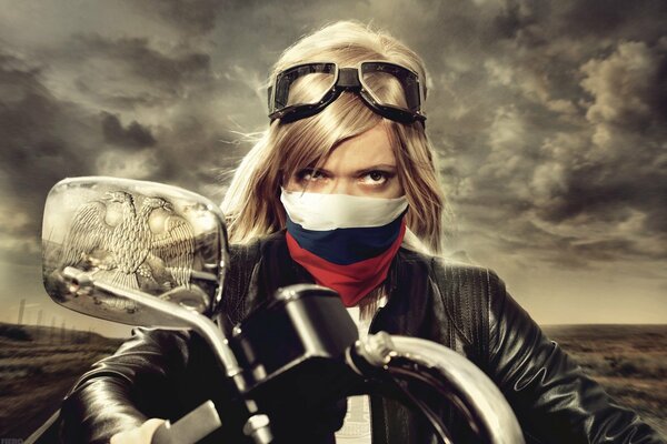 Blonde on a motorcycle with a mask