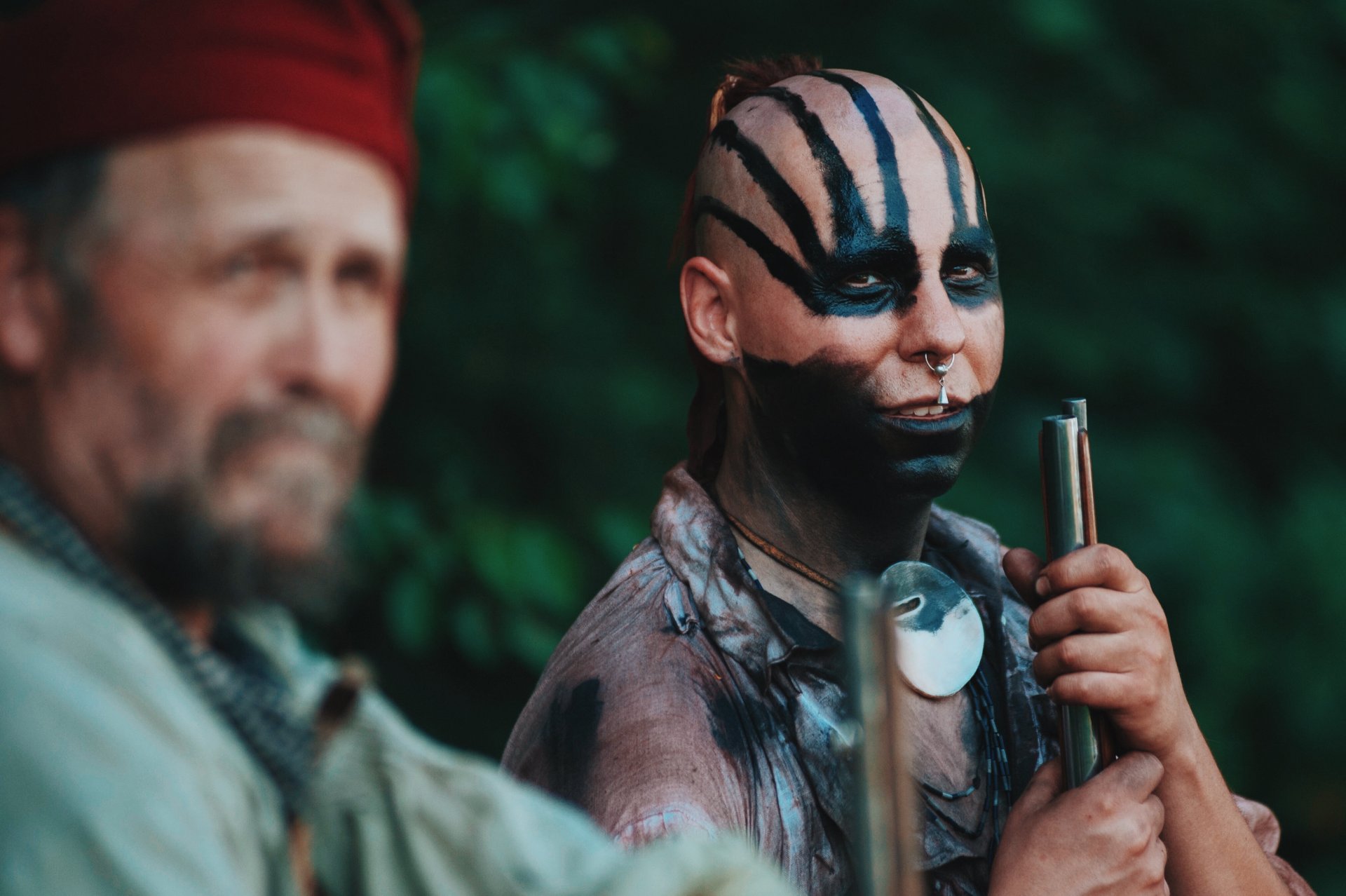 indian men paint face feathers background