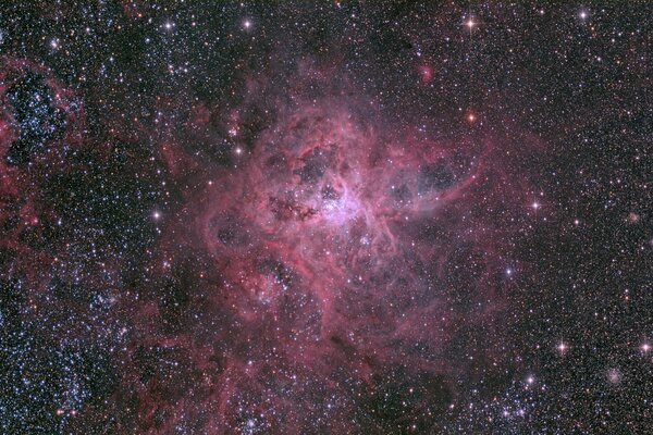 Galassia nera e rosa nello spazio, bagliore delle stelle