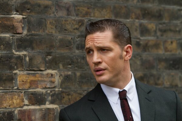 Tom Hardy with a questioning expression on his face