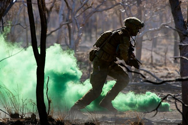 A soldier with an Australian Army signal grenade with