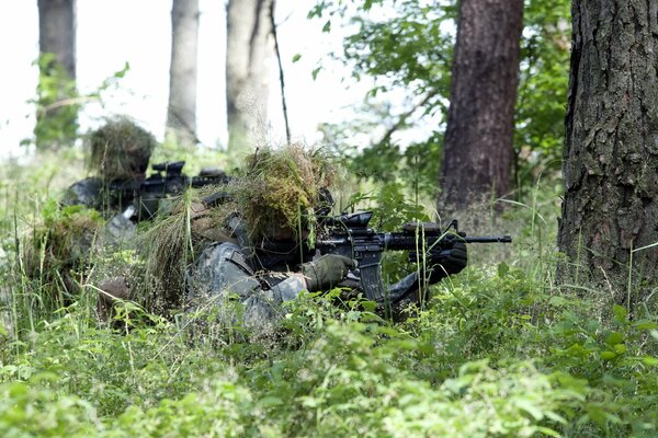 Soldiers in disguise with weapons