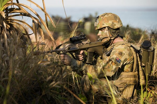 The soldier is preparing to make a shot