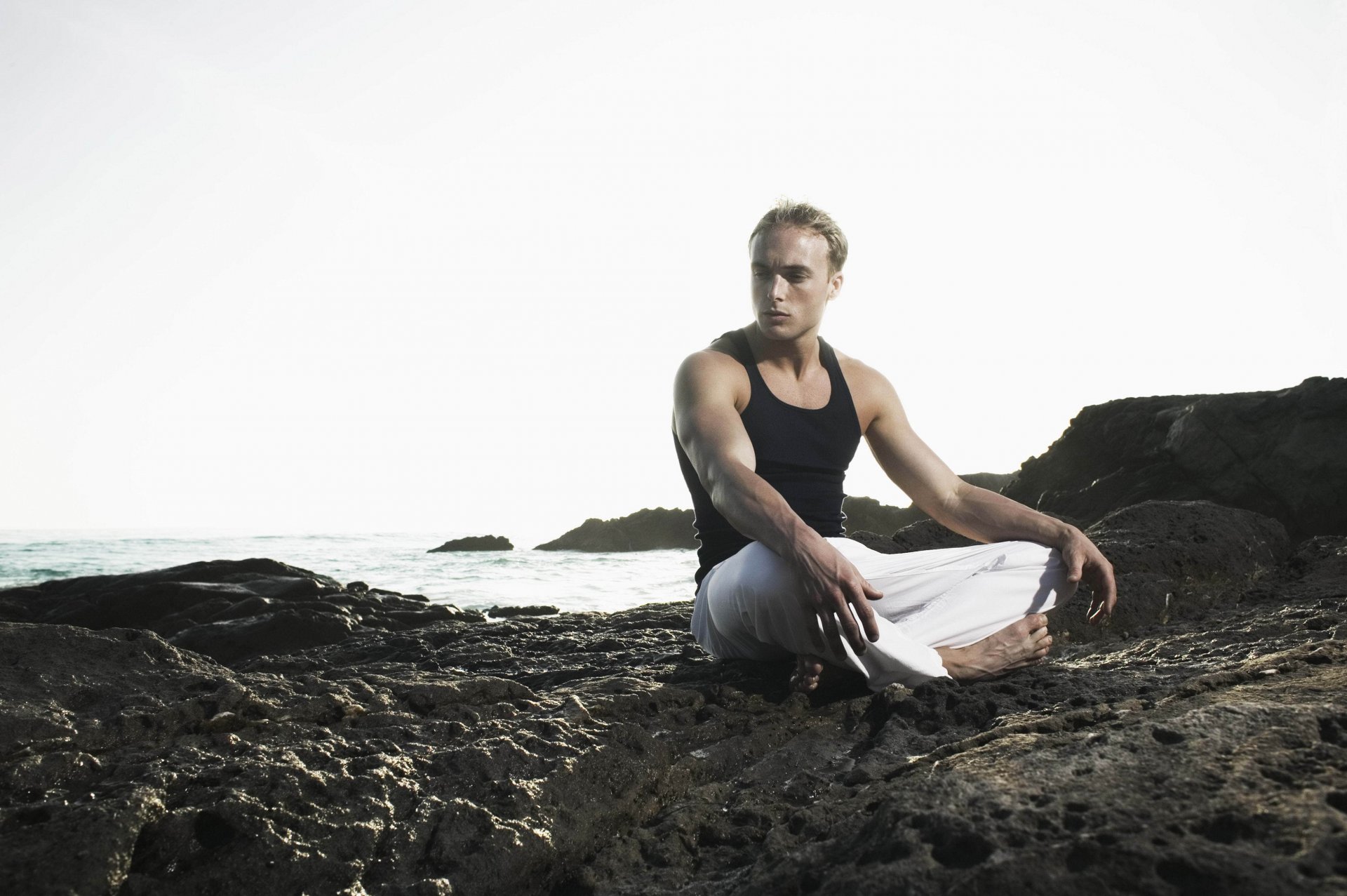 ummer stones sky guy sitting