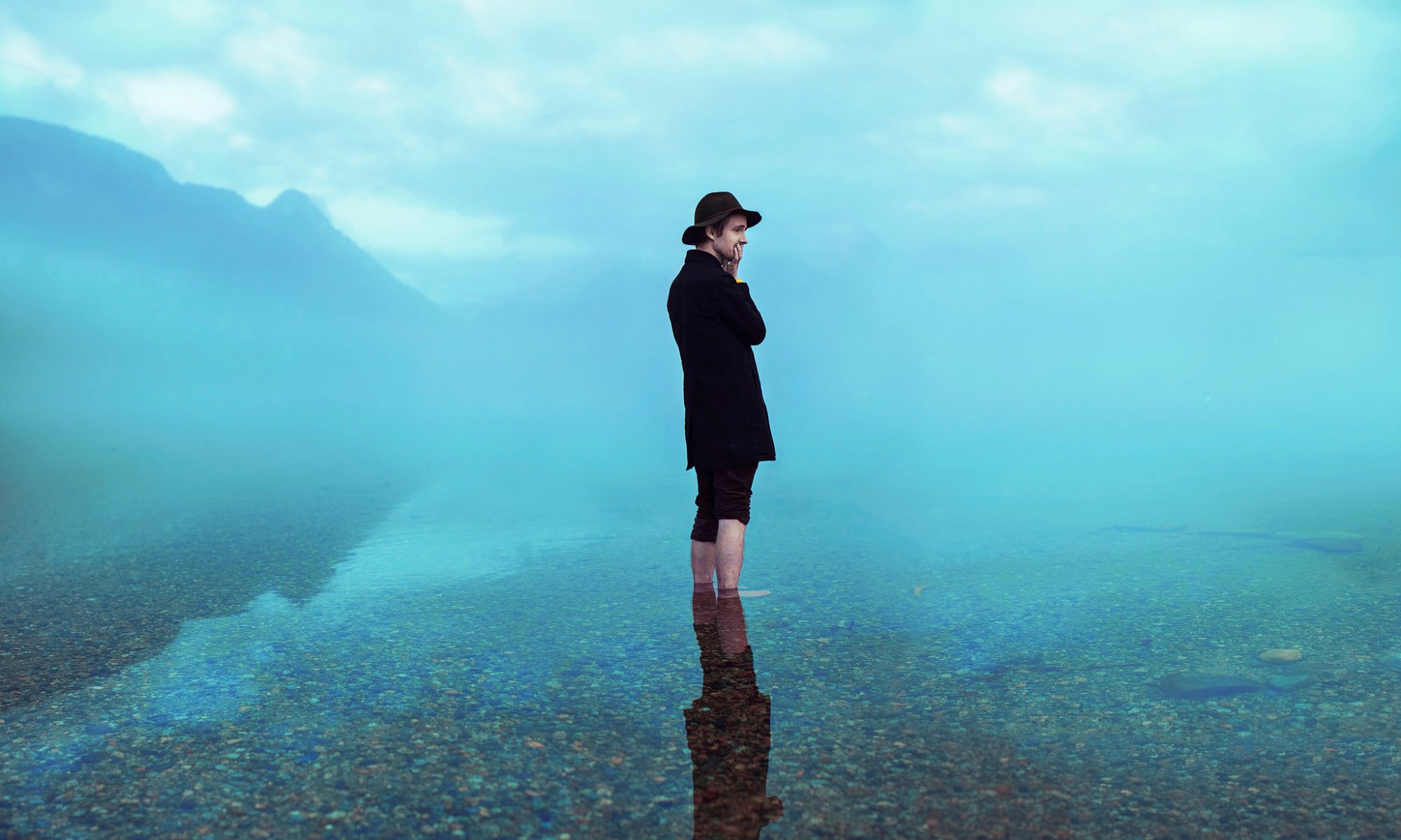 in the hat in water reflection fog