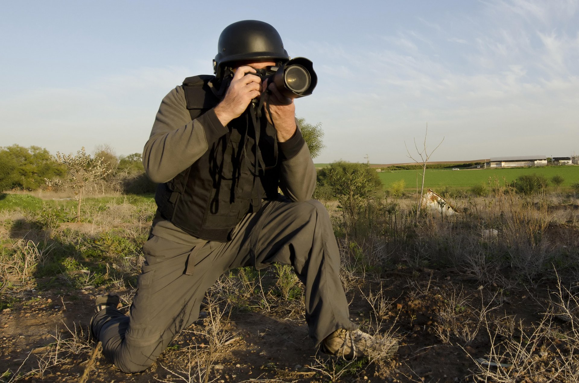 military correspondent frontline journalist special correspondent photojournalist photographer ammunition camouflage equipment helmet vest camera combat zone the beginning of the XXI century beginning of the xxi century wallpaper