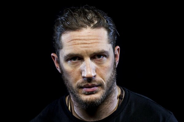 Tom Hardy on a black background