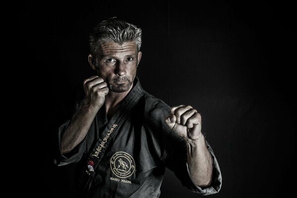 Portrait of a fighter in a professional shooting