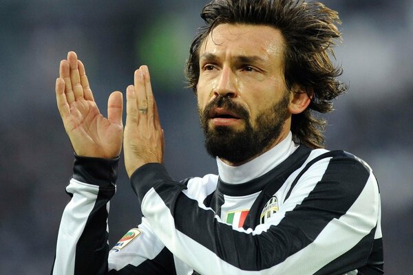 Applauding athlete andrea pirlo