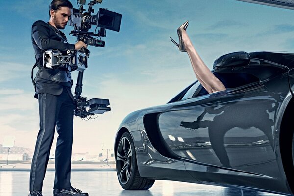 Photo of a girl and a man , a photo session of a car