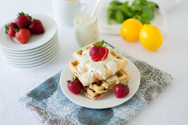 Morning breakfast with strawberries and waffles