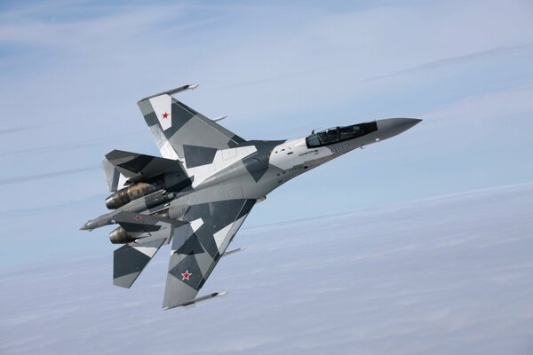 The Su-35 fighter makes a maneuver