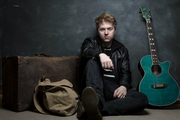 Fotoshooting für einen Musiker mit einer Gitarre