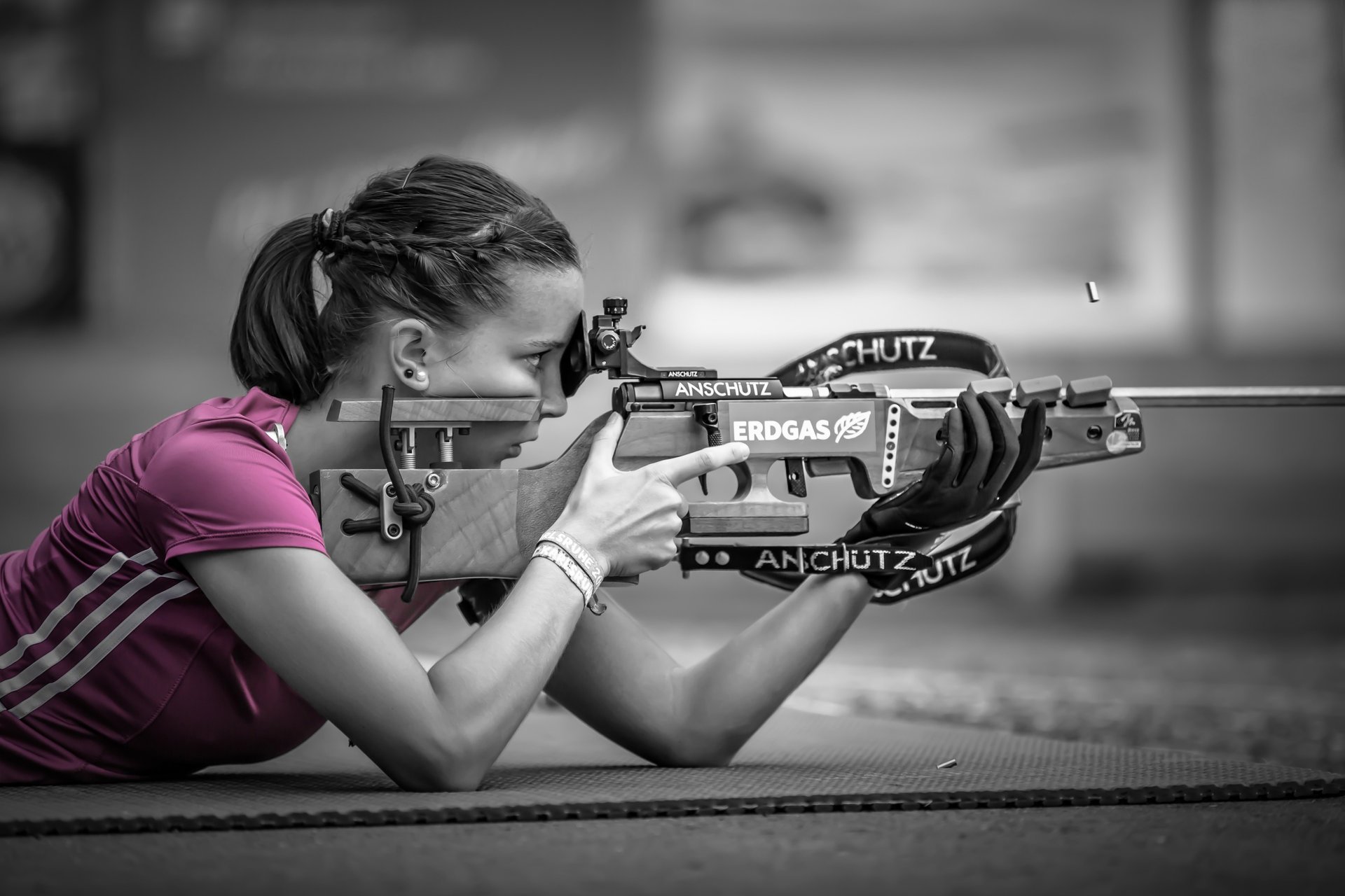 pink sniper bokeh shooting girl