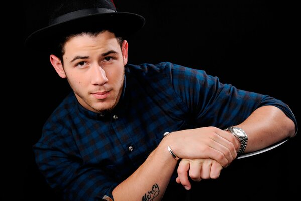 Nick jonas Sänger Foto mit Hut