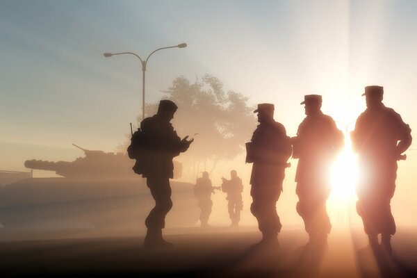 Siluetas de soldados que sirven en el ejército a la luz