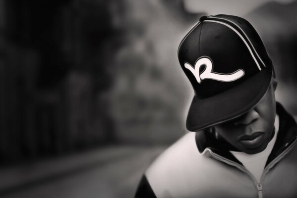 Rapper in a cap, black and white photo