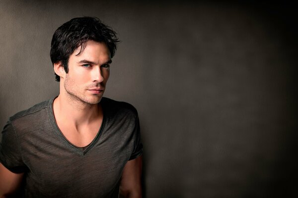 Professional photo of an actor on a dark background