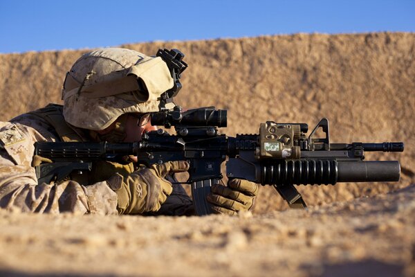 Fighters in the desert are sitting in ambush