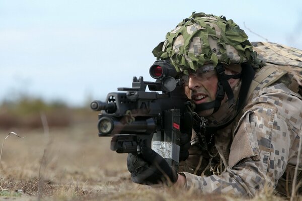 Latvian soldier with a firearm m