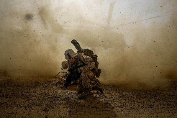 A soldier in combat. Helicopter. Army