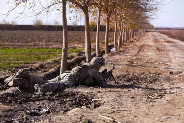 A soldier lies in ambush