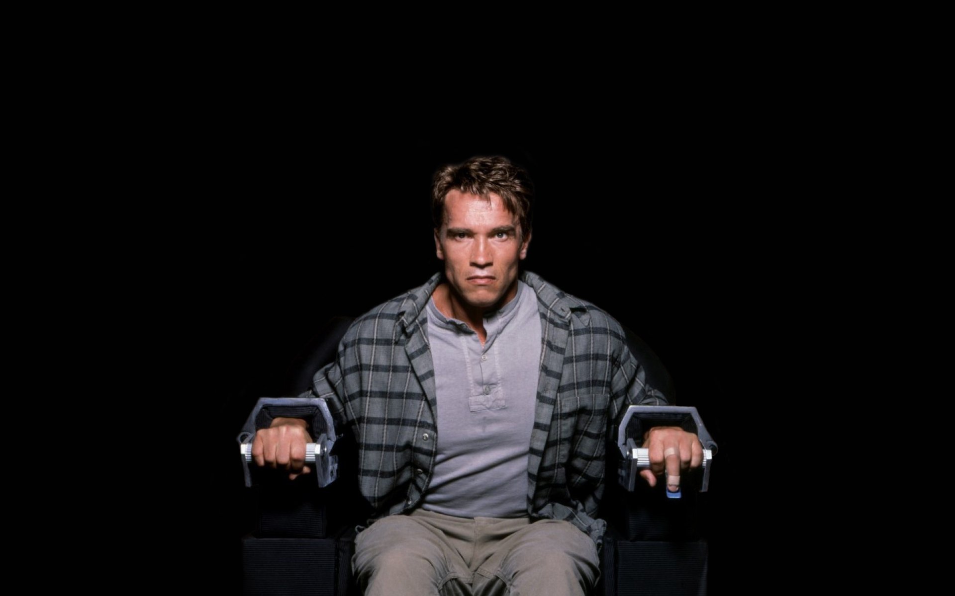 total recall recall all arnold schwarzenegger evil sitting chair jacket chained