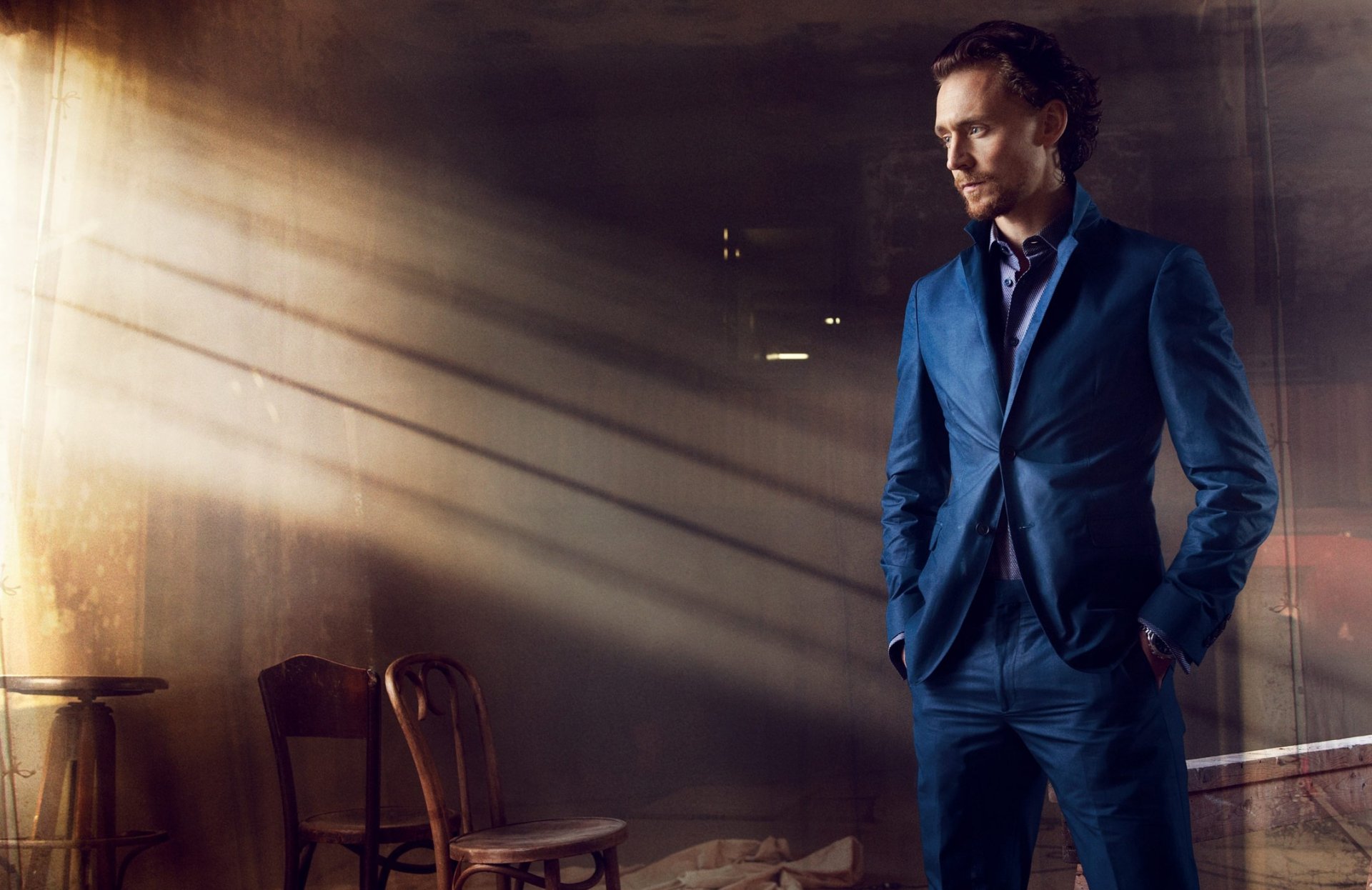 hiddleston tom hiddleston man actor suit blue chair