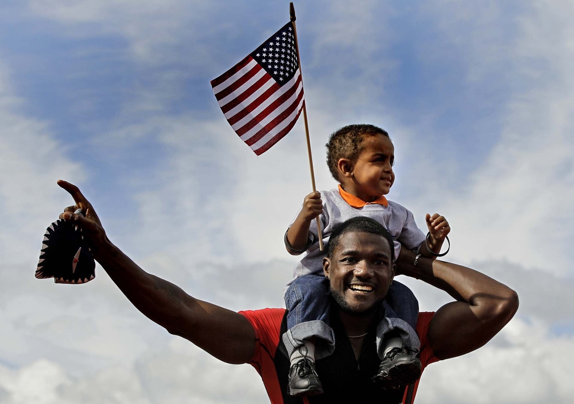 justin gatlin justin gatlin atleta corredor velocista hombre niño afroamericanos negros negros bandera cielo