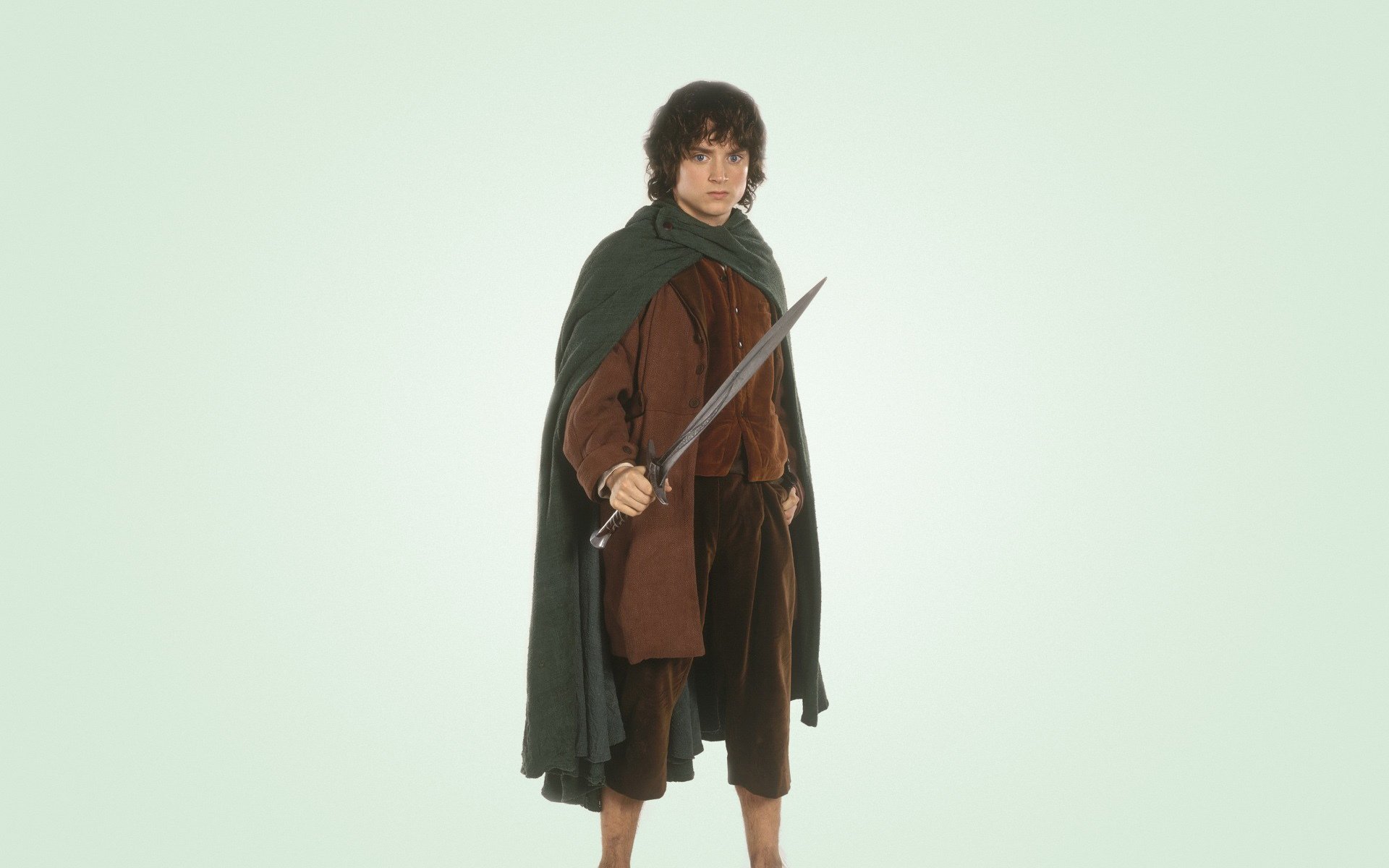 elijah wood sword Frodo Baggins light background lord of the ring