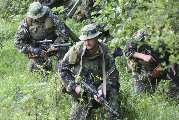 Armed men in ambush