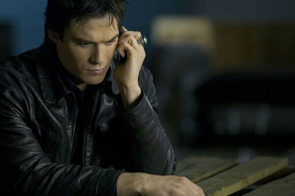 Ian Somerhalder, actor of the Vampire Diaries series, in a leather jacket and a ring on his hand