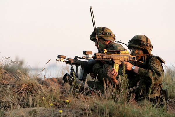 Soldiers of the Latvian army with weapons