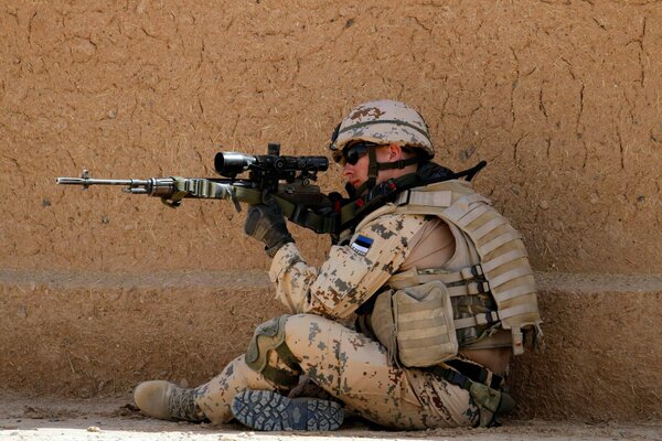 An Estonian soldier prepares to shoot