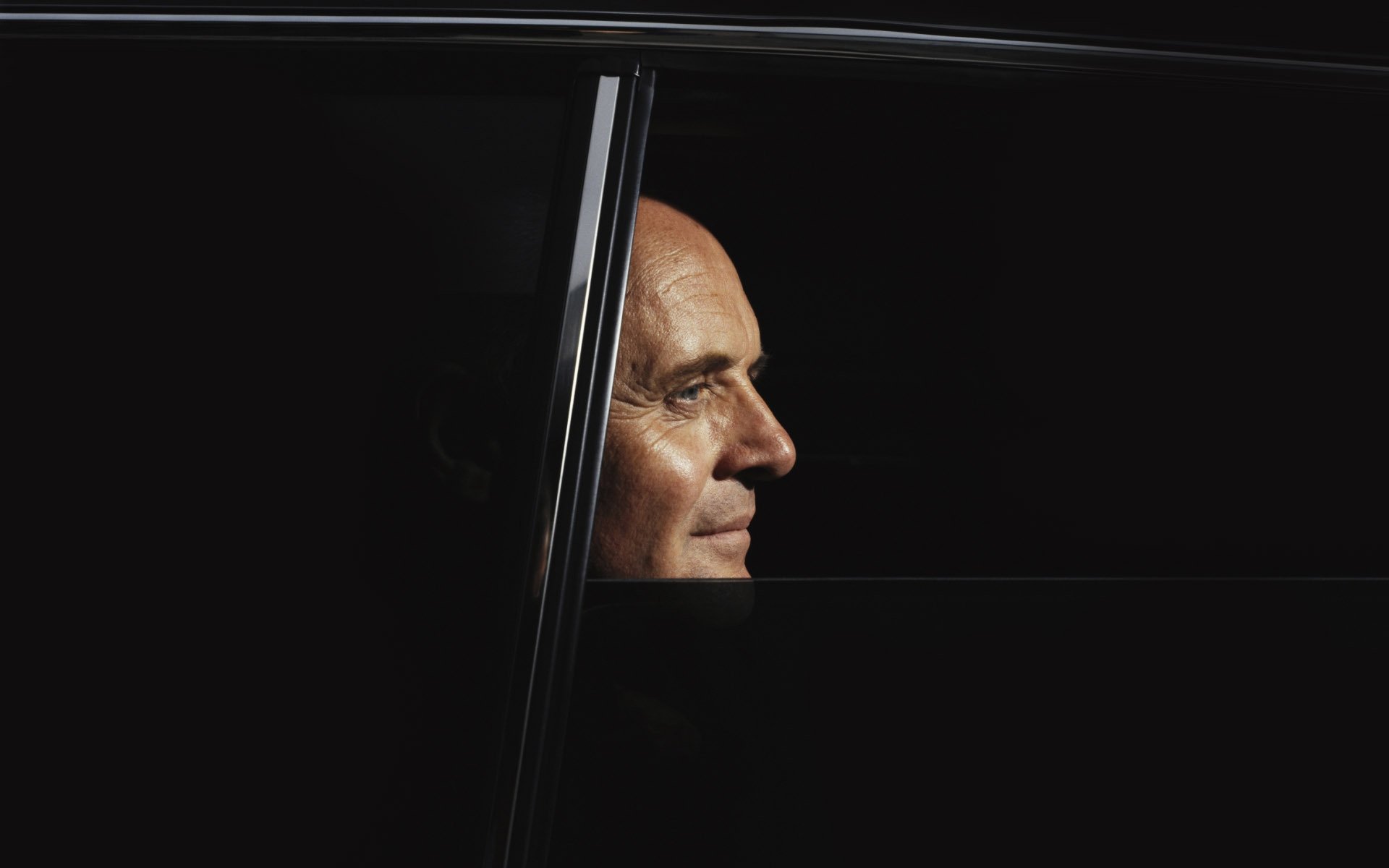 anthony hopkins men face twilight in the car background