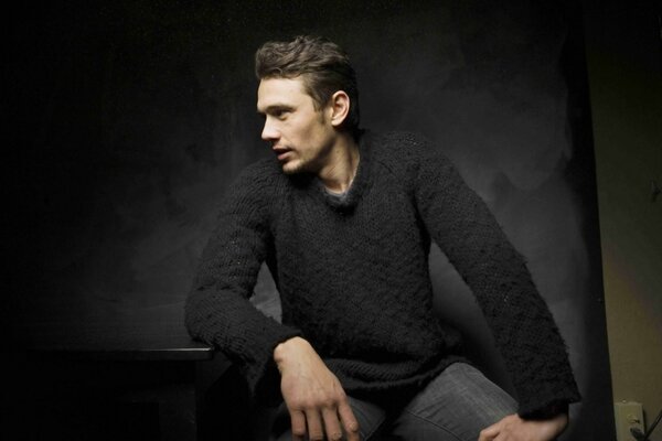 James Franco in a black sweater